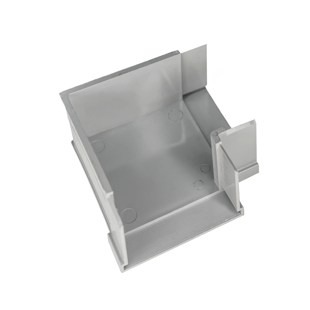 Gray linear drain component with sloped interior basin and side outlet connector, shown in perspective view.
