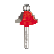 Red cove and bead router bit with silver metal shank and bearing, Freud brand marking visible on shaft.