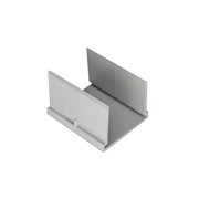 Stainless steel linear drain component with U-shaped channel and vertical flanges on both sides.