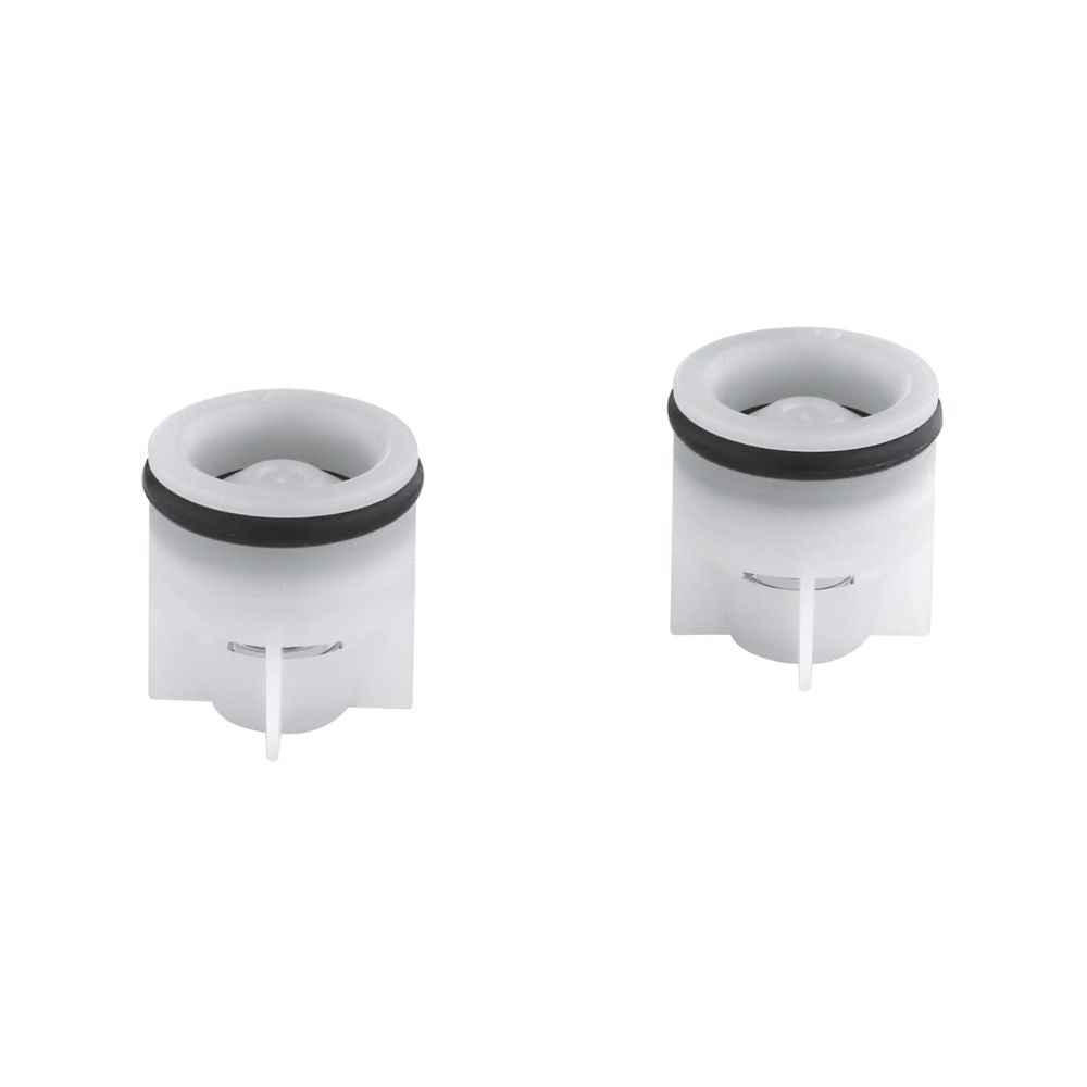 Two white cylindrical non-return valves with black sealing rings and internal springs.