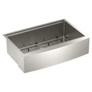 Stainless steel undermount apron front sink with single bowl and grid accessory.