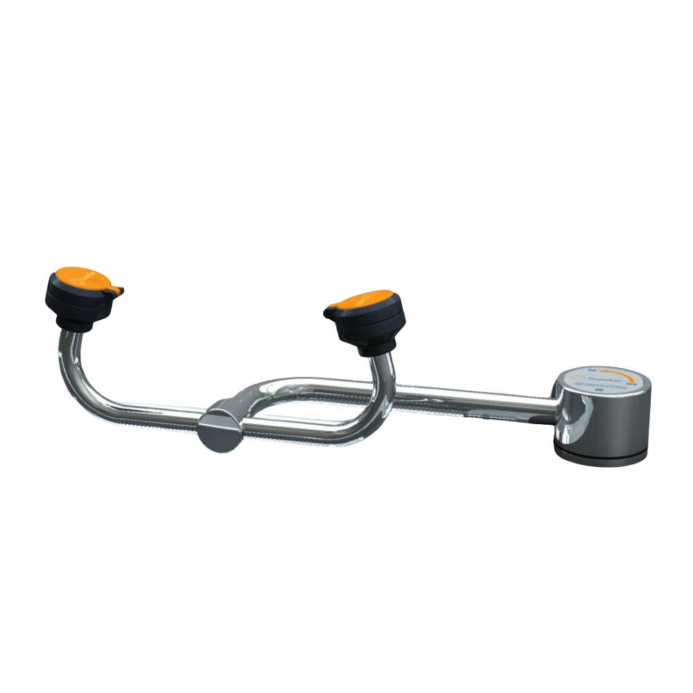 Stainless steel deck-mounted eyewash station with two orange and black eyecups connected by curved arms and control valve on 