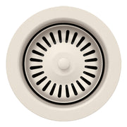 Soft white metal basket strainer with black radial slots and center post, viewed from above.