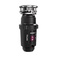 Black Moen GX Pro Series garbage disposal with stainless steel sink flange and control panel.