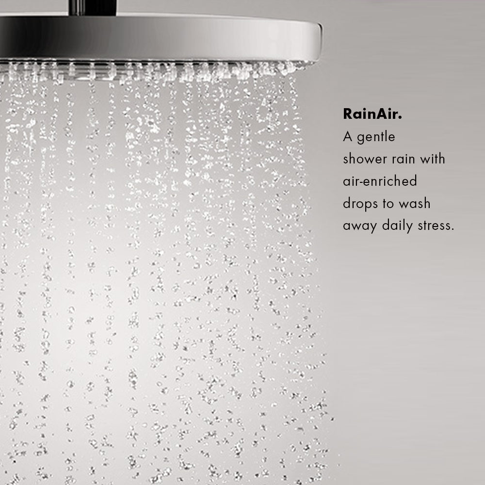 Chrome showerhead with rain-style water spray flowing downward in multiple streams.