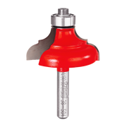 Red router bit with rounded cove profile and metal shank and bearing.