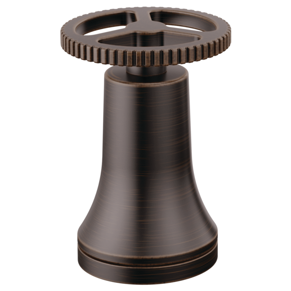 Venetian bronze faucet handle with ribbed wheel design and bell-shaped base.