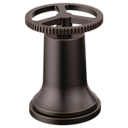 Venetian bronze faucet handle kit with gear-textured wheel grip and bell-shaped base.