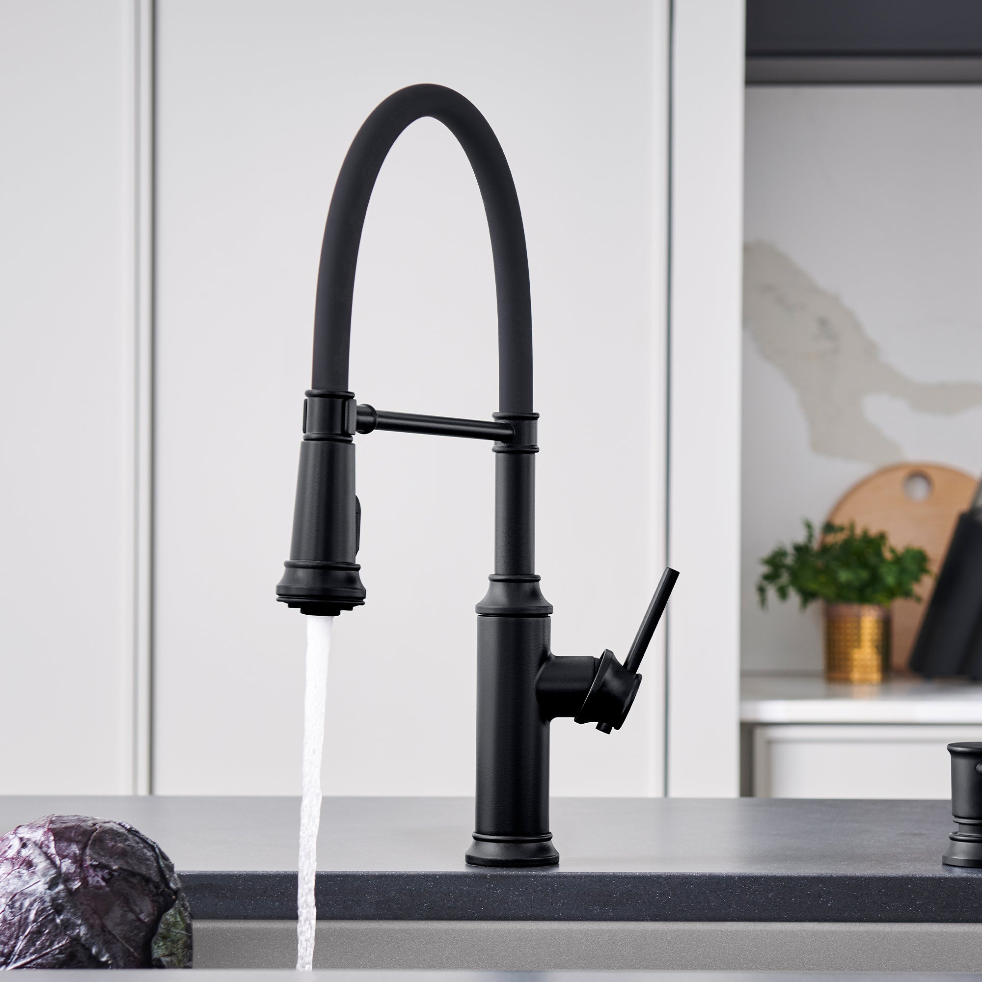 Matte black semi-pro kitchen faucet with tall arched spout, pull-down spray head, and single side lever handle.