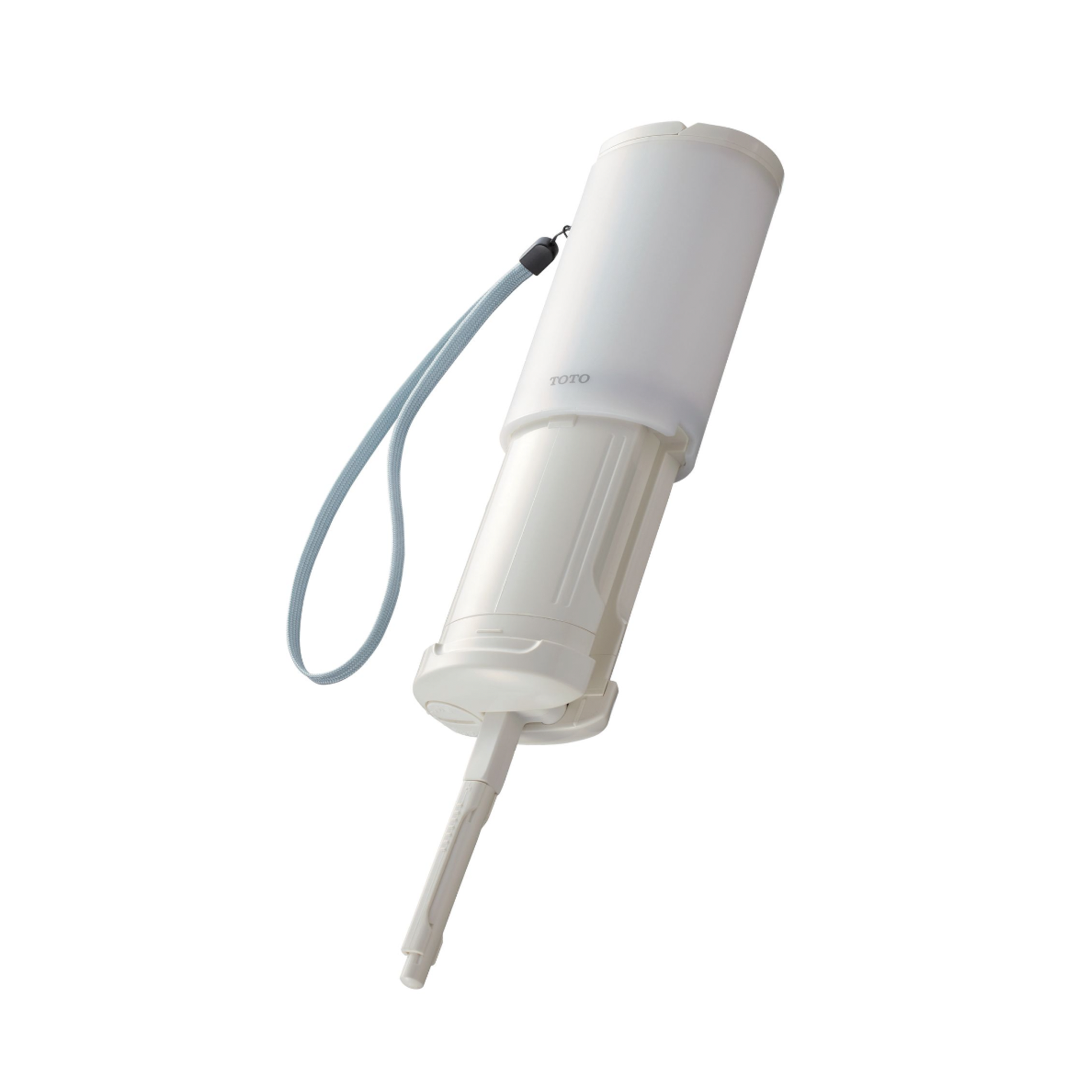 White cylindrical portable washlet device with attached gray cord and removable nozzle attachment.