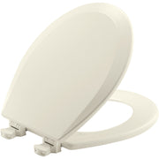 Biscuit-colored round toilet seat with enameled wood finish and white hinges shown in open position.