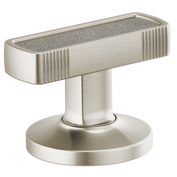 Brushed nickel T-shaped lavatory knob with concrete inlay top and circular base mounting plate.