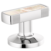 Chrome lavatory knob handle with mother-of-pearl inlay top and vertical ribbed sides on circular base.