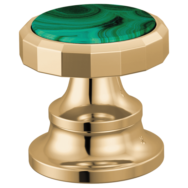 Polished gold faucet handle with malachite green stone inlay and faceted wheel knob design.