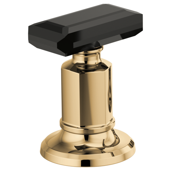 Black crystal knob handle mounted on polished brass base and cylindrical valve body.