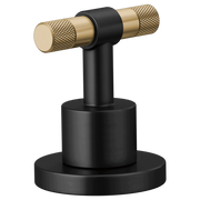 Matte black and luxe gold T-lever handle kit with textured grip ends on round base.