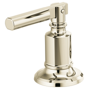 Polished nickel widespread lavatory faucet lever handle kit with cylindrical body and round base.