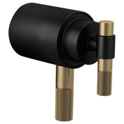 Matte black cylindrical thermostatic trim with dual luxe gold t-lever handles and knurled grip sections.