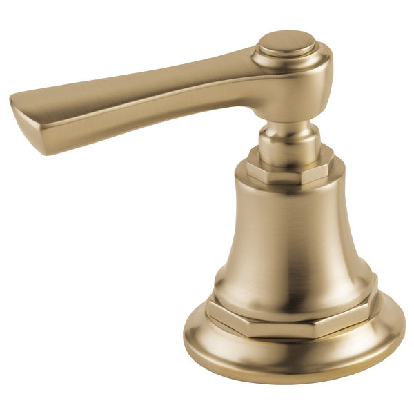 Champagne bronze lever handle faucet with bell-shaped base and elongated spout for Roman tub installation.