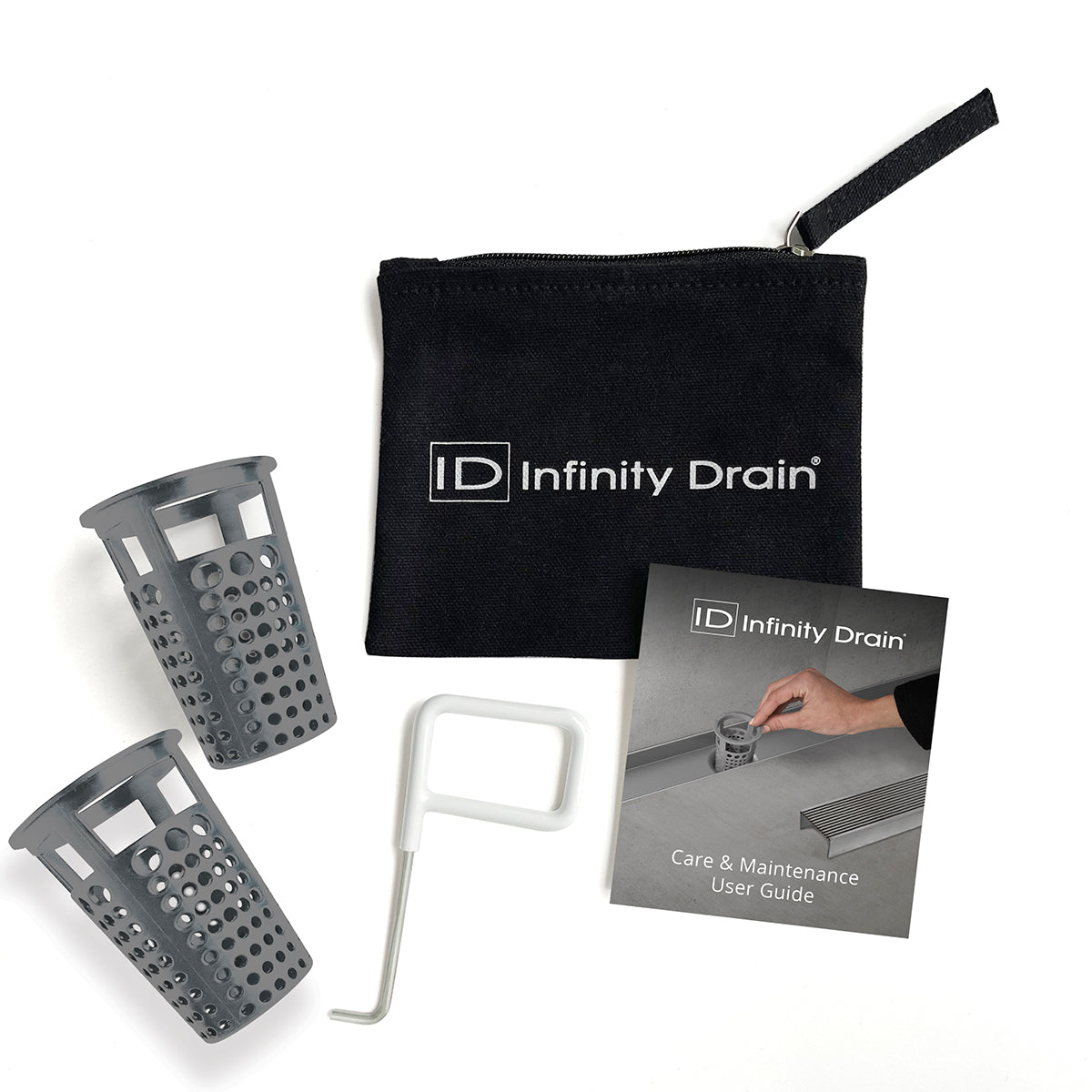 Black Infinity Drain maintenance kit containing two gray perforated baskets, white removal tool, care guide, and black carryi