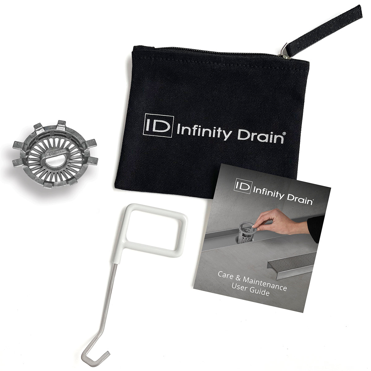 Infinity Drain maintenance kit containing black pouch, metal strainer, white removal tool, and care guide.