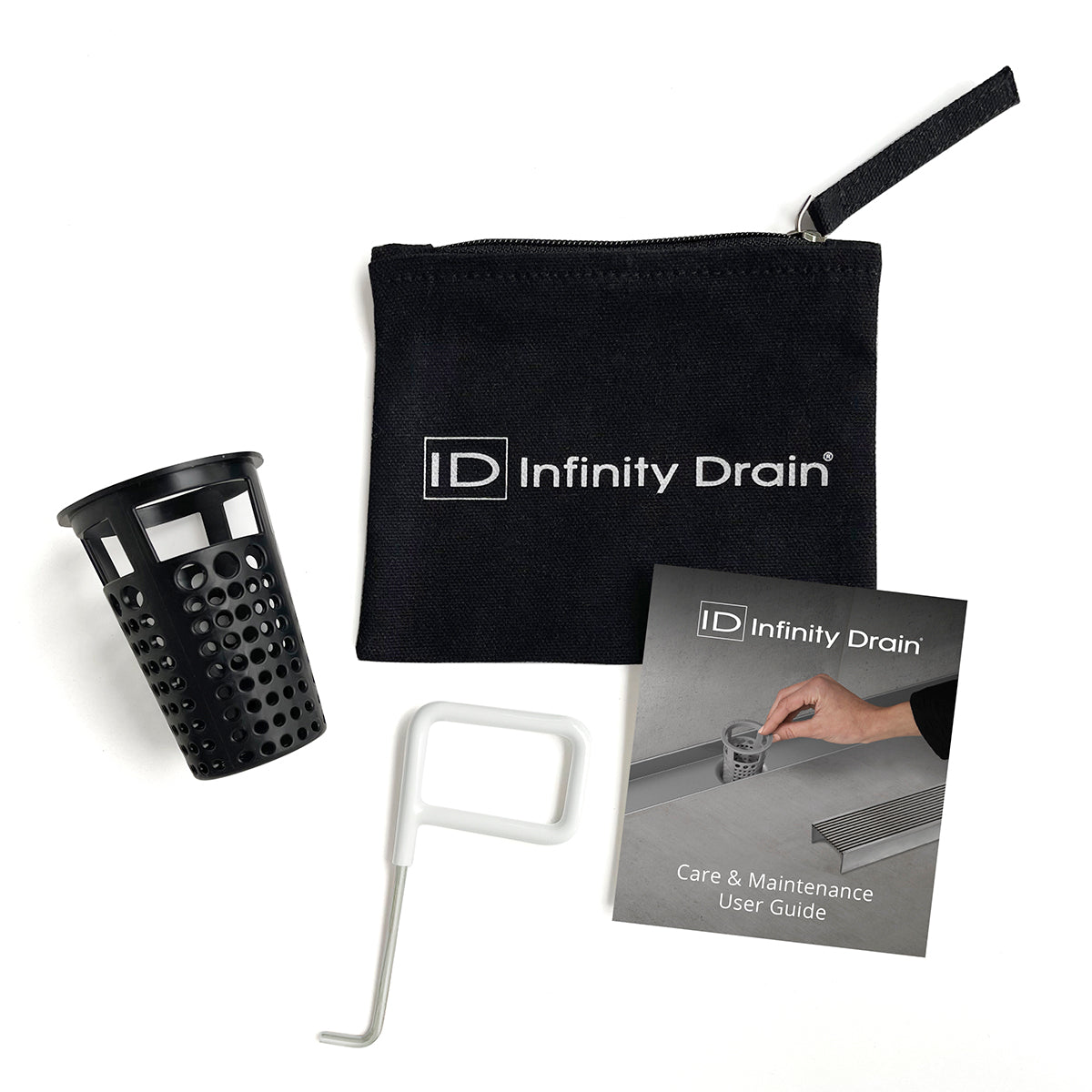 Black Infinity Drain hair maintenance kit containing black perforated basket, white removal tool, black carry pouch, and care
