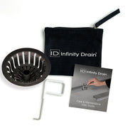 Black drain strainer with slotted design, white removal tool, black carrying pouch, and care instruction booklet.