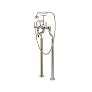 Polished nickel floor-mount tub filler with curved spout, hand shower, and dual lever handles.