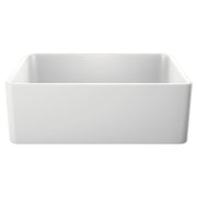 White rectangular farmhouse sink with single bowl and curved front apron design.