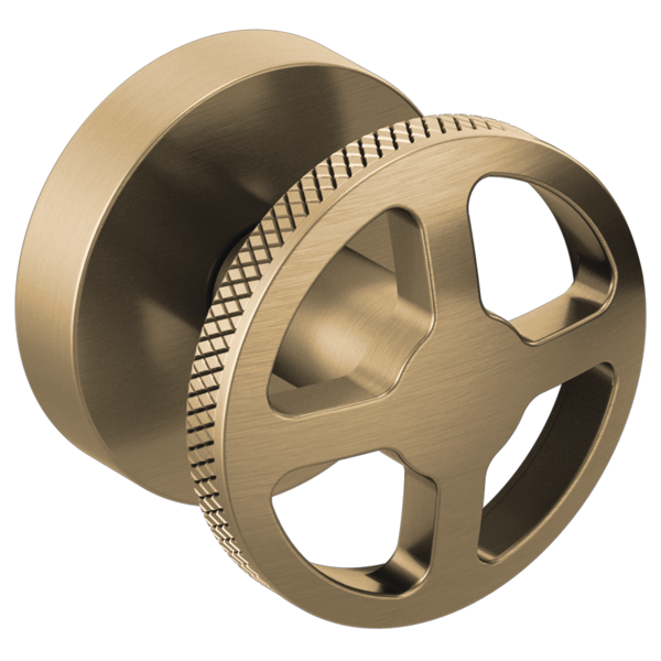 Brass wheel handle with textured grip ring and mounting flange for wall-mount tub filler.