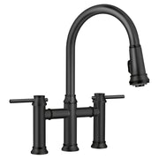 Matte black bridge faucet with pull-down spray head and dual lever handles.