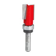 Freud flush trim router bit with red cutting head, metal bearing, and silver shank marked with product number.
