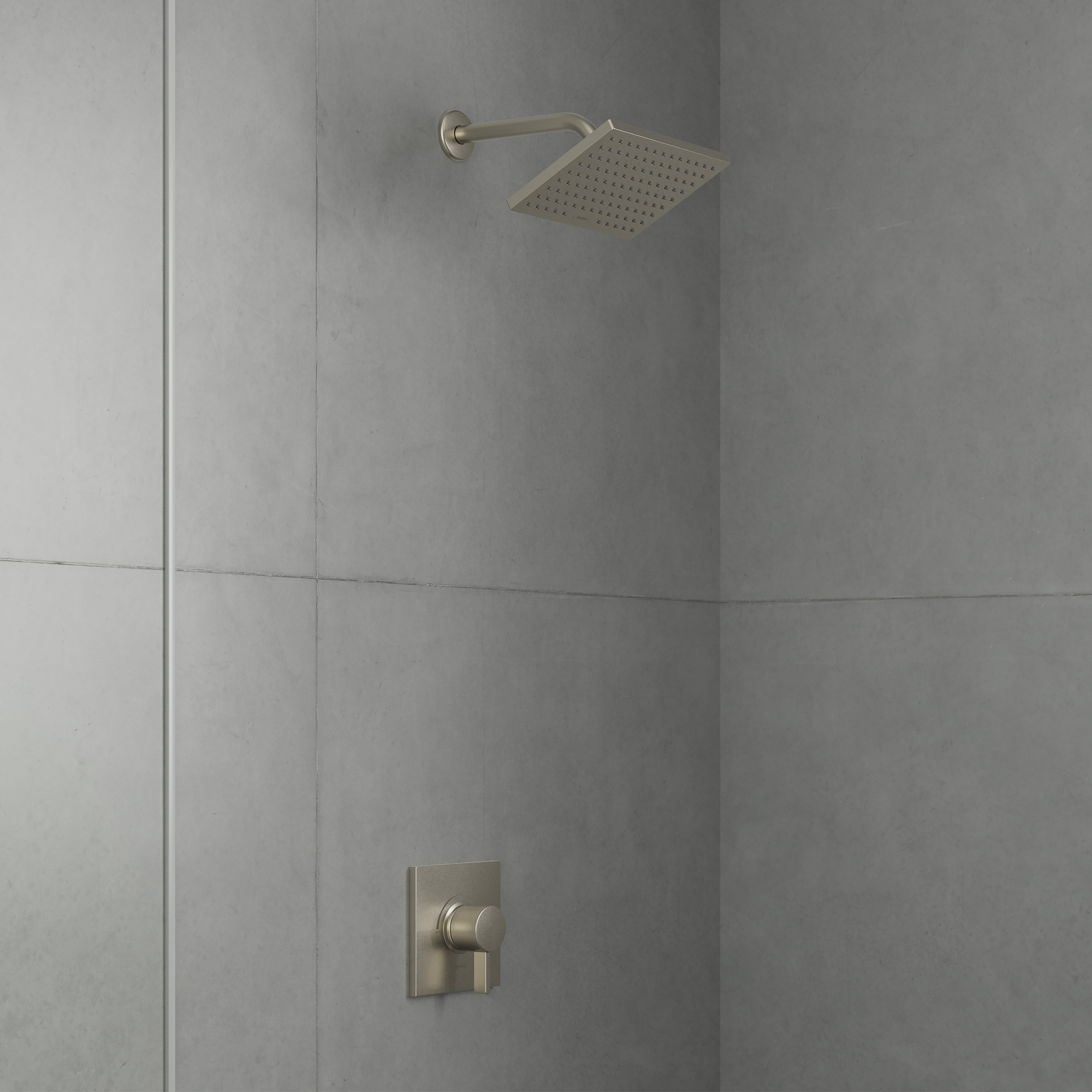 Brushed nickel shower system with square overhead showerhead and wall-mounted pressure balance valve on tiled shower wall.