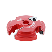 Red and white router cutter head with dual cutting edges and adjustment screws on sides.