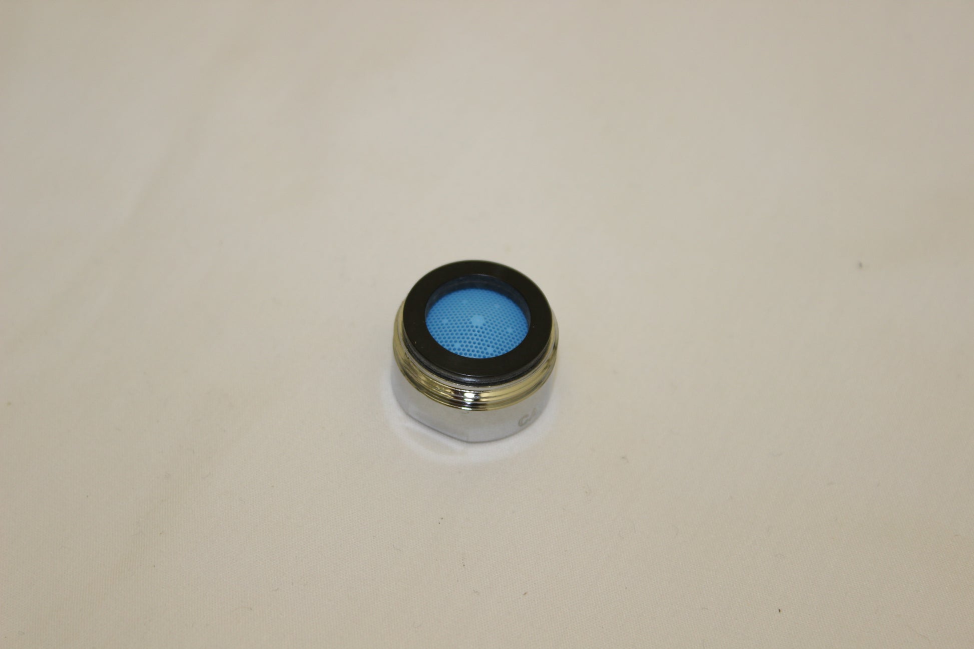 Chrome and black sprayhead aerator with blue mesh insert, circular design.