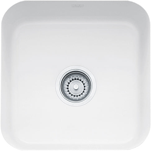 White fireclay undermount kitchen sink with single bowl and chrome drain strainer, rounded rectangular shape.