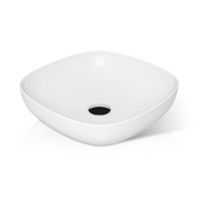 White oblong above-counter basin with curved sides and centered black drain opening.