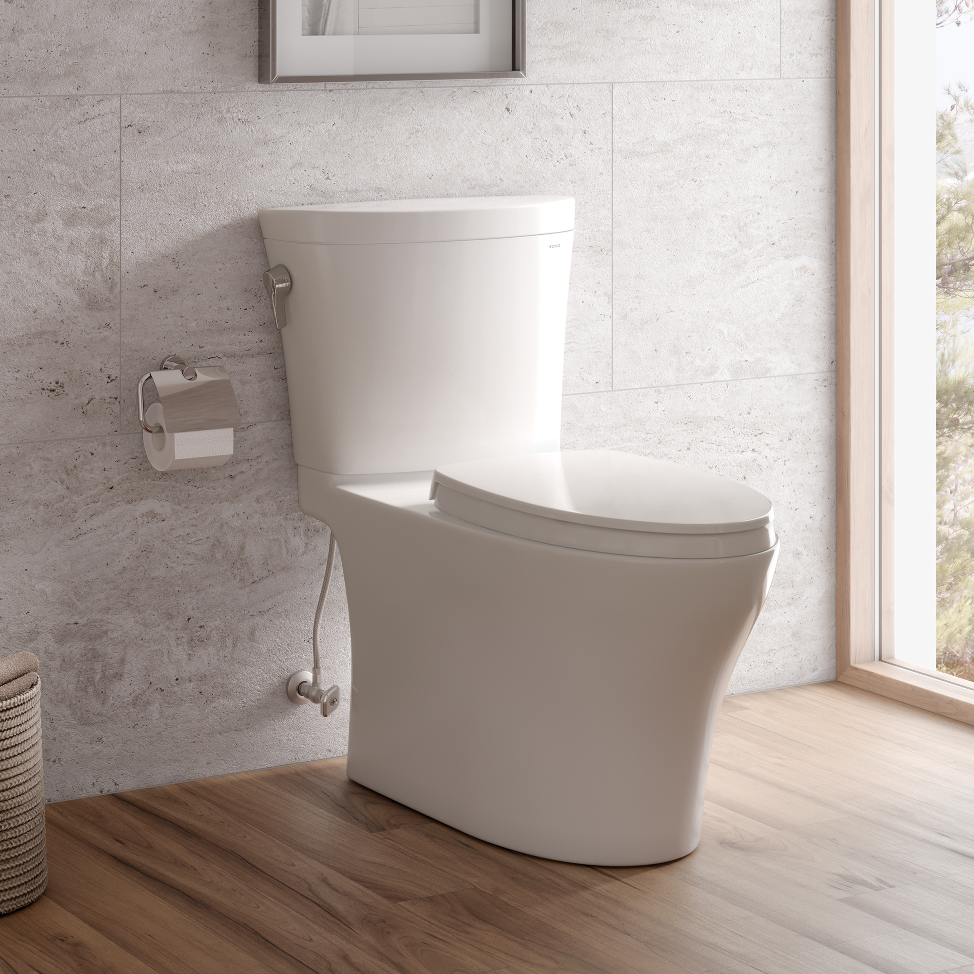 White two-piece elongated toilet with soft-close seat in modern bathroom setting.