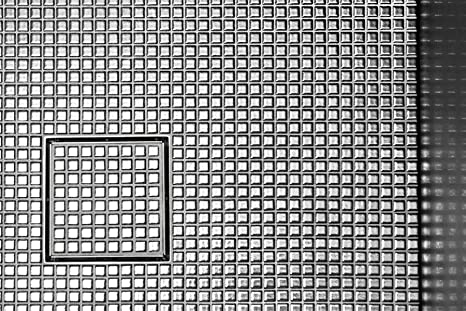 Satin stainless steel square drain grate with grid pattern and center drain opening.