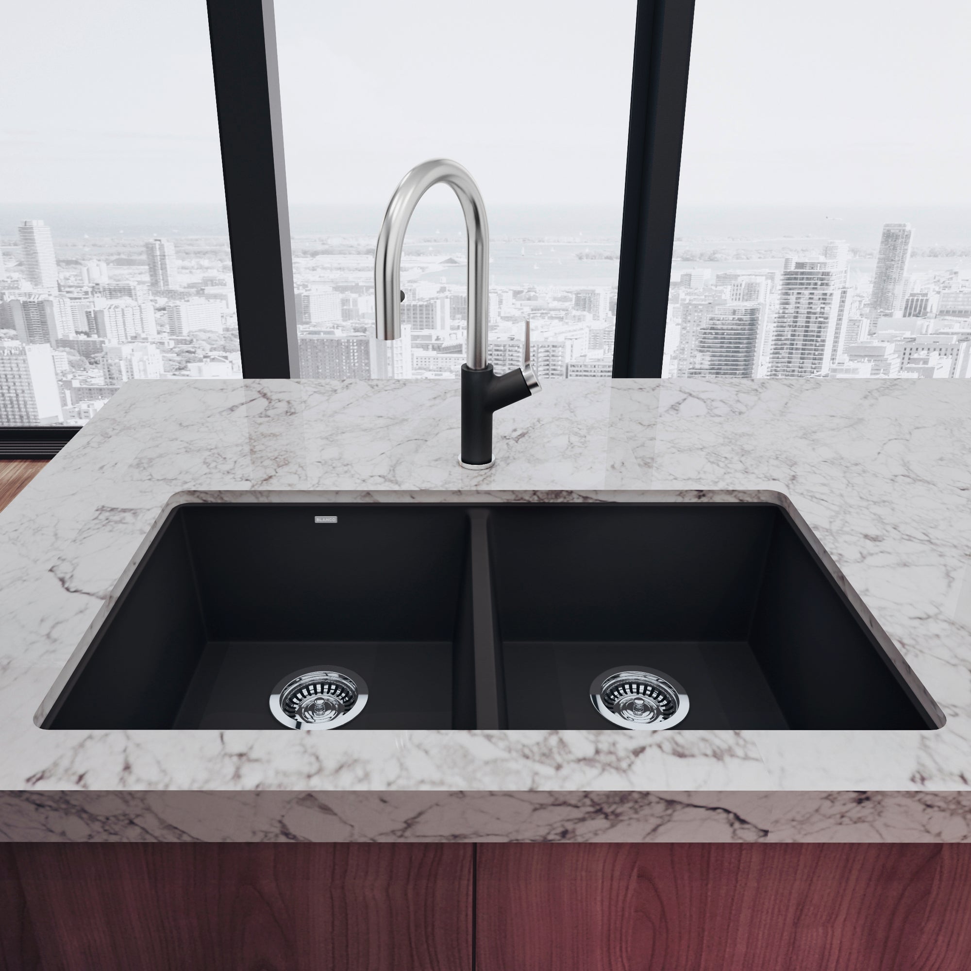 Anthracite undermount double bowl kitchen sink with two equal compartments and chrome faucet on marble countertop.
