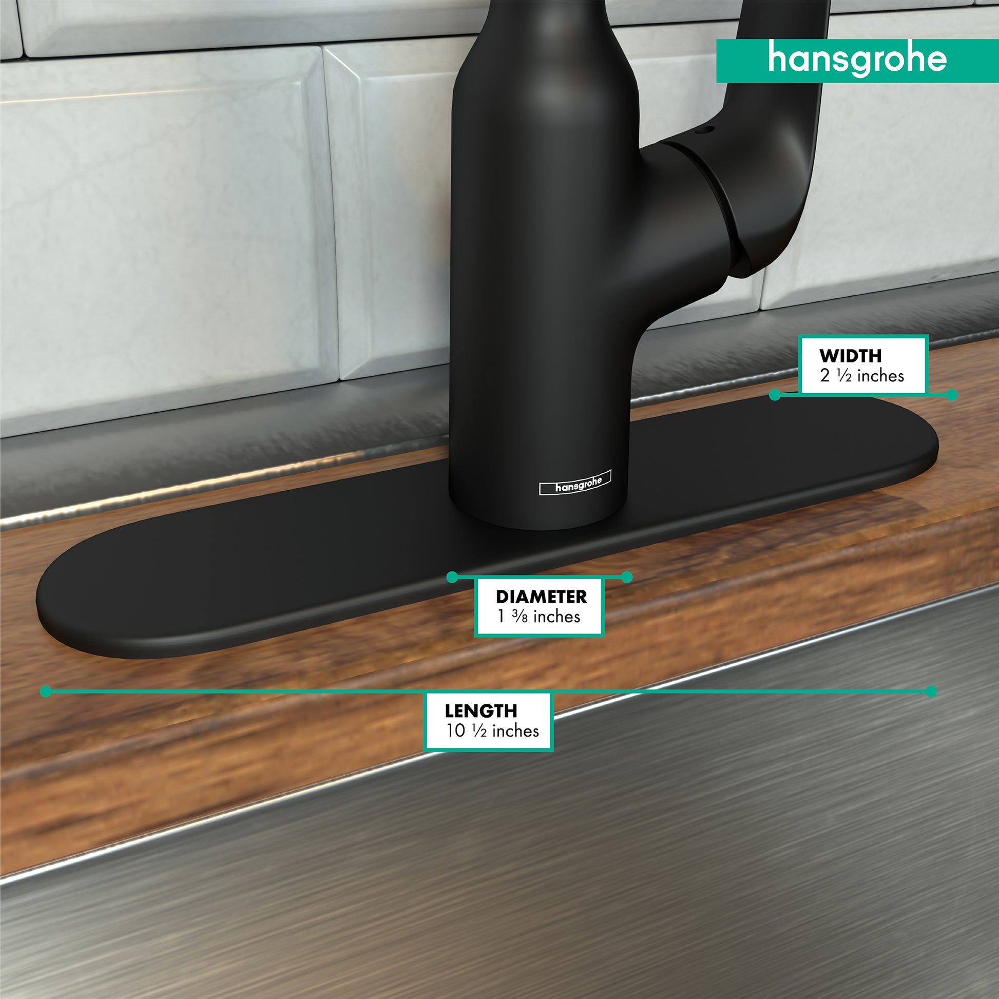 Matte black oval base plate with faucet mounted on wood countertop, showing 10.5" length, 2.5" width, and 1.375" diameter.