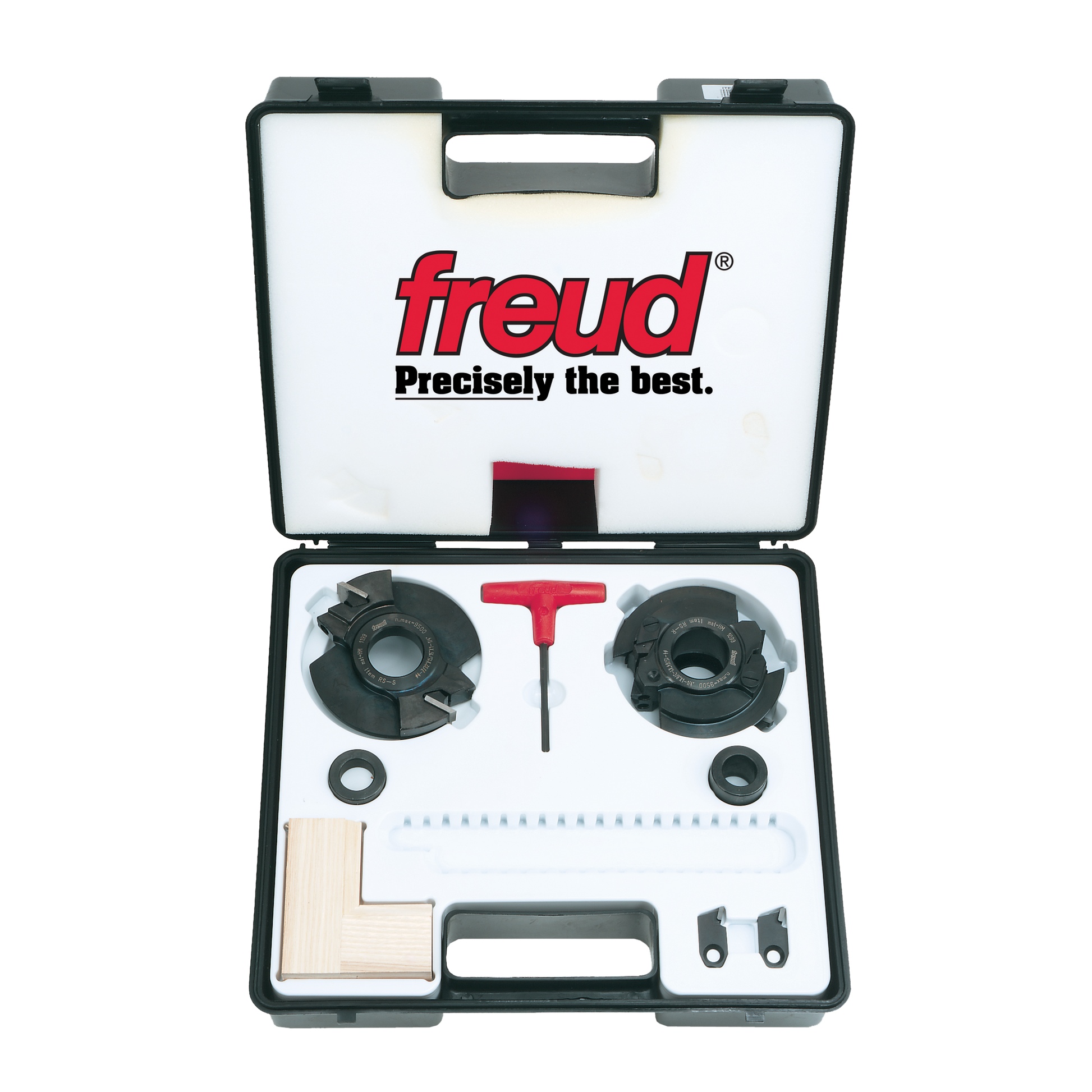 Freud RS1000 router bit set in black carrying case with two saw blades, red wrench, washers, and wooden sample block.