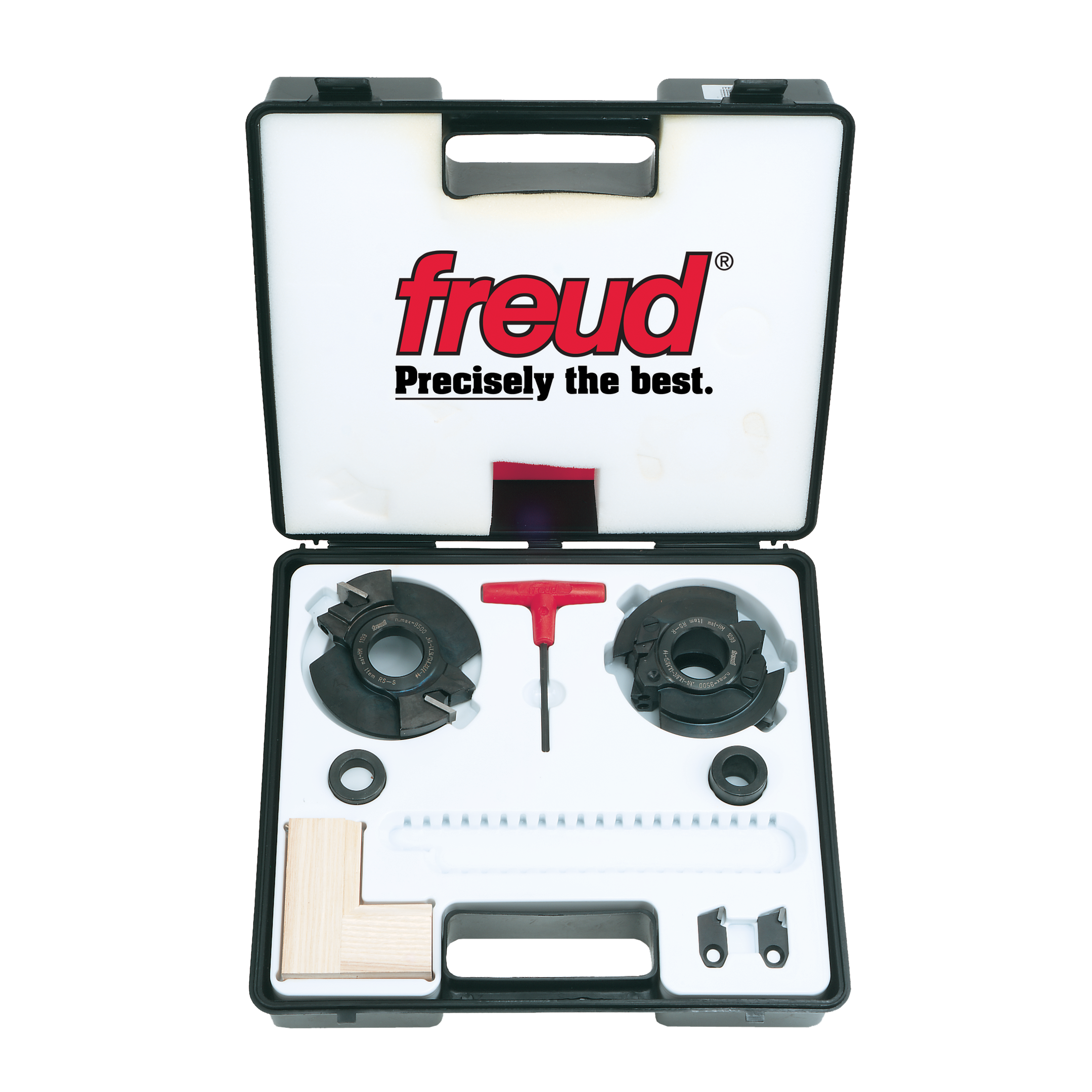 Freud RS1000 router bit set in black carrying case with two saw blades, red wrench, washers, and wooden sample block.