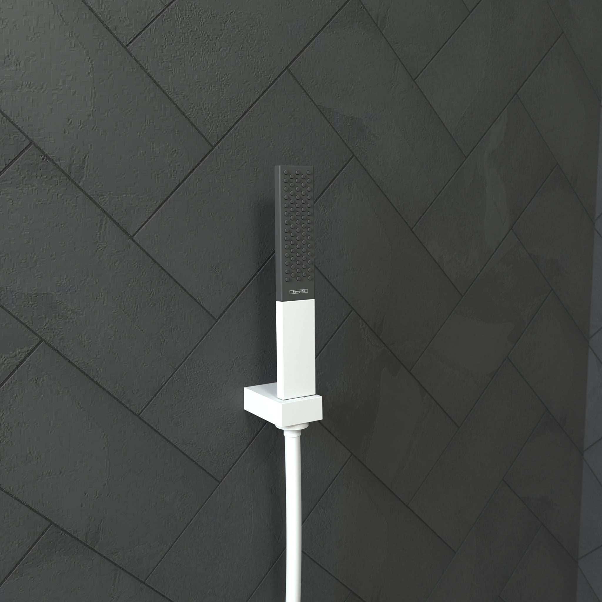 Matte white rectangular handshower with perforated showerhead mounted on wall with white supply hose.