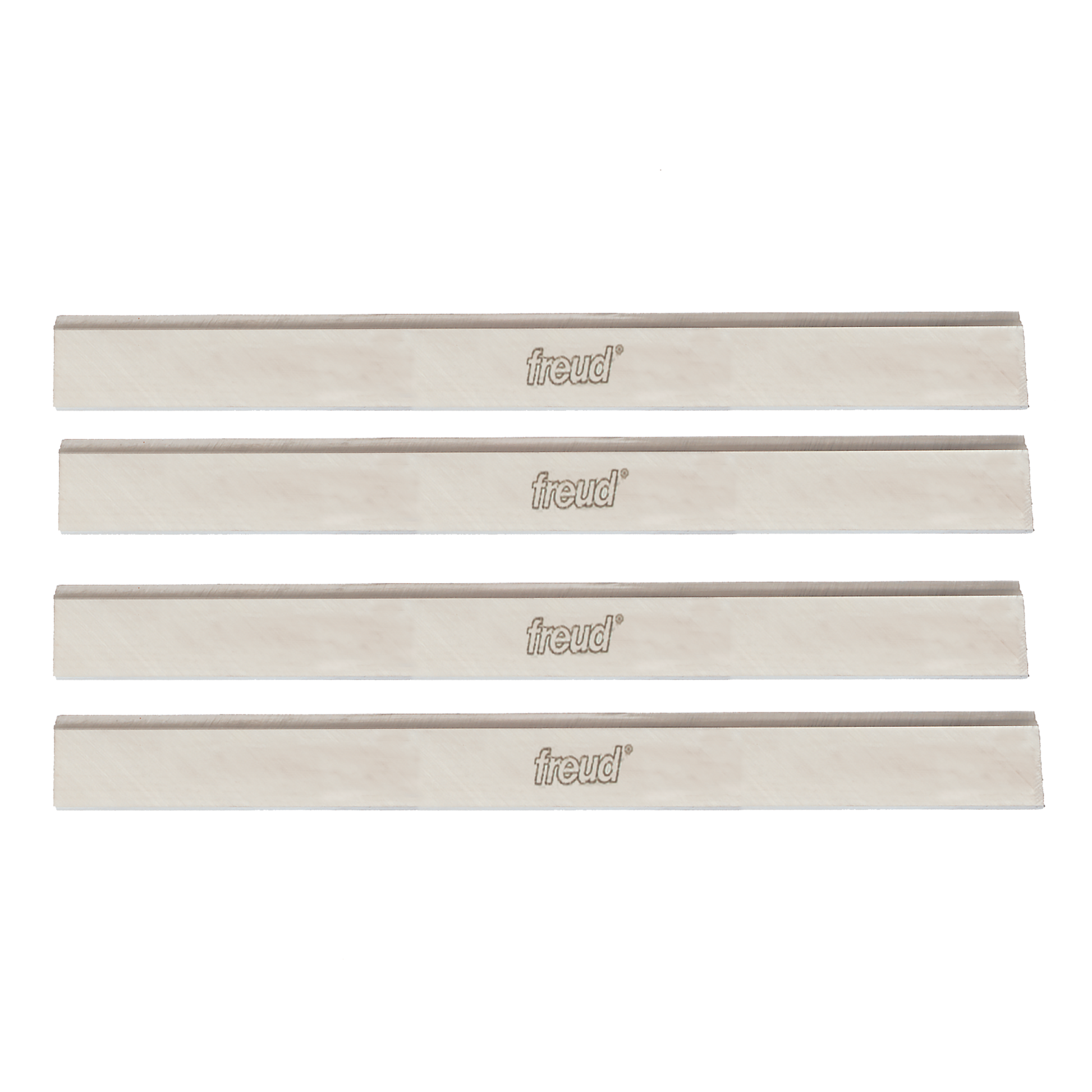 Four rectangular Freud high speed steel planer knives with beveled edges and Freud branding.
