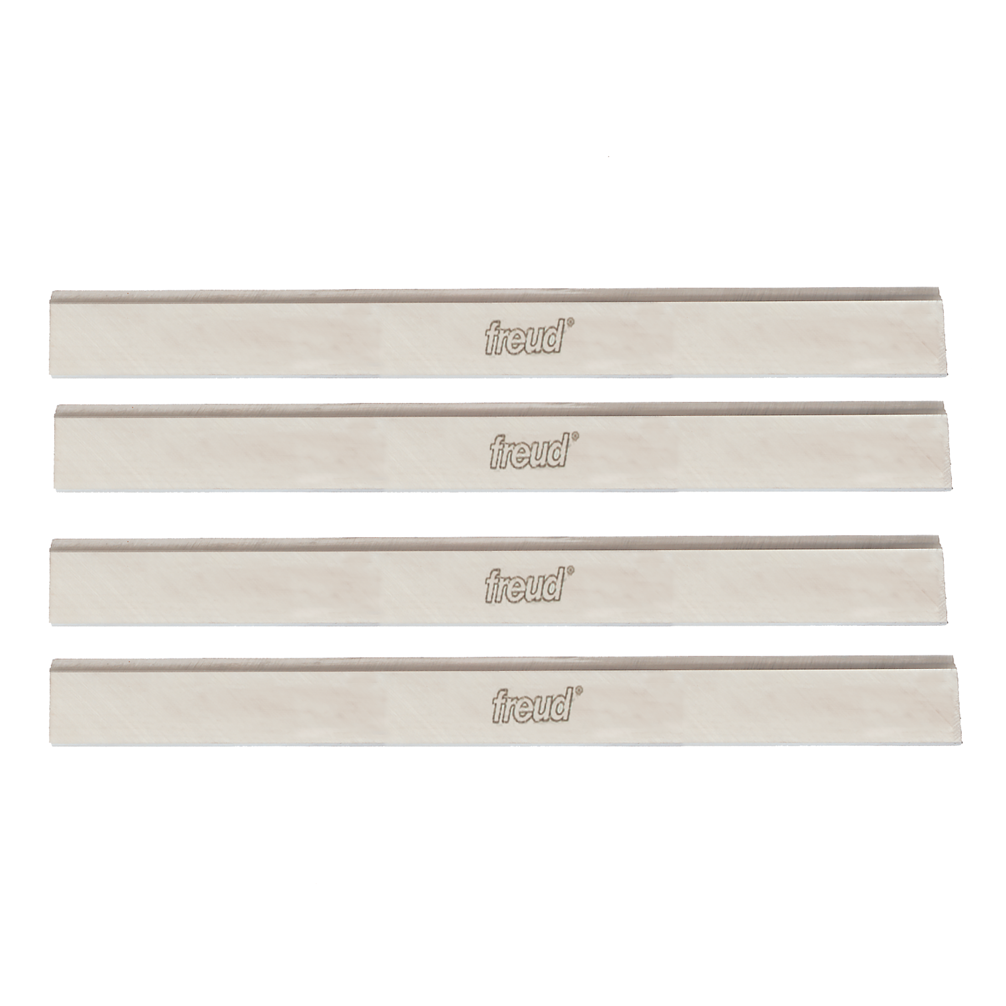 Four rectangular Freud high speed steel planer knives with beveled edges and Freud branding.