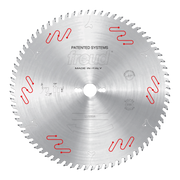 Circular saw blade with silver finish, white center hole, red patented tooth design markings, and "Freud" branding, made in I