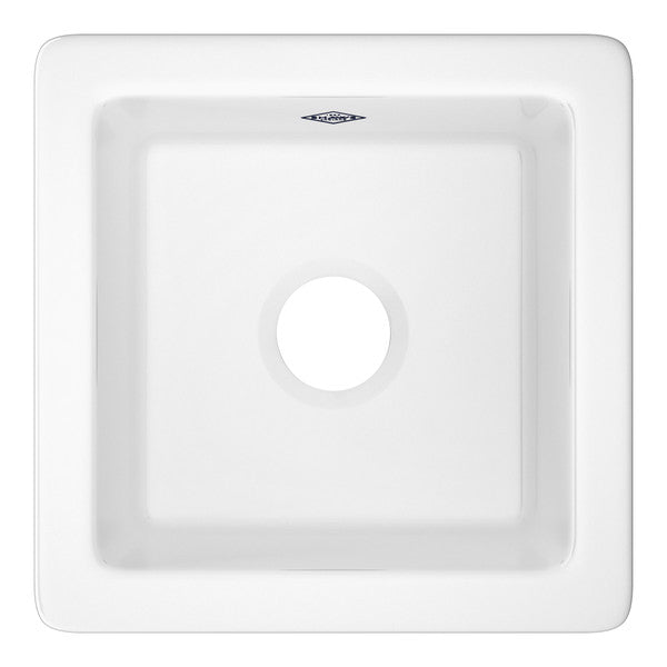 White fireclay single bowl bar sink with rounded edges and drain hole, viewed from above.