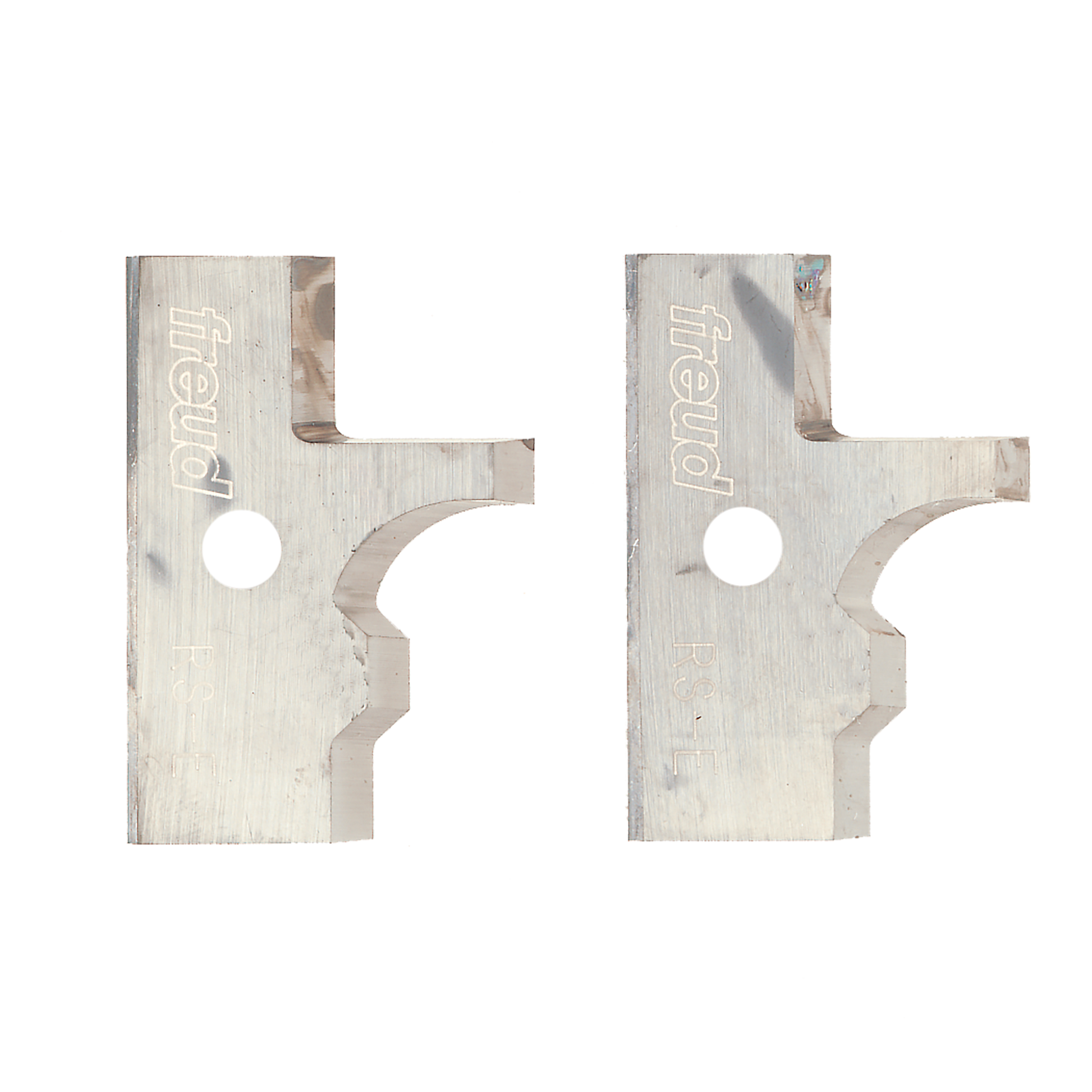 Two metal router knives with Freud branding, featuring matching curved and notched cutting profiles with circular mounting ho