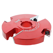 Red router cutter head with four cutting edges and adjustment screws mounted on sides.
